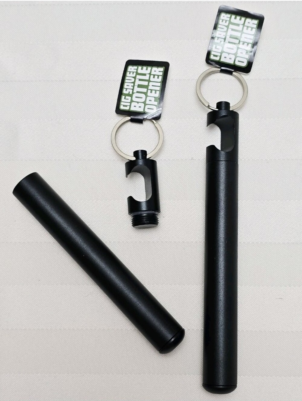 NWT Smokezilla Black Metal Keychain Storage Tube Container with Bottle Opener